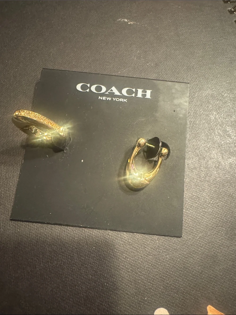 Coach Gold-Tone Interlocking Hoop Stud Earrings - Picture 3 of 4